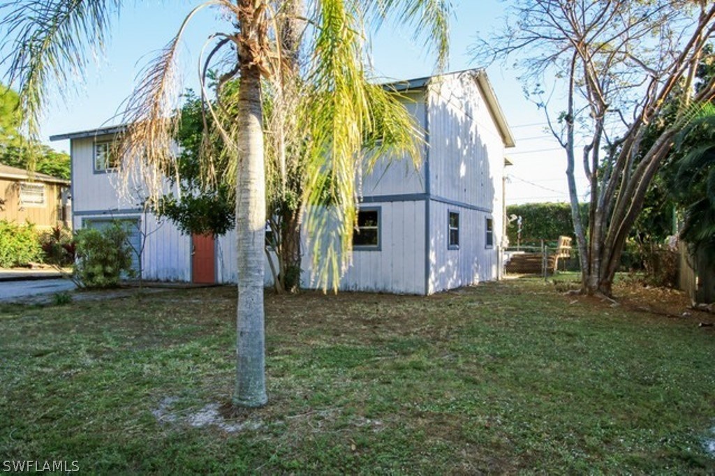 8070 Matanzas Road Fort Myers, FL 33967 - Photo 2 of 25 a view of a house with a yard