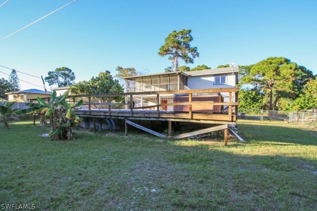 8070 Matanzas Road Fort Myers, FL 33967 - Photo 6 of 25 a view of a house with a backyard porch and sitting area