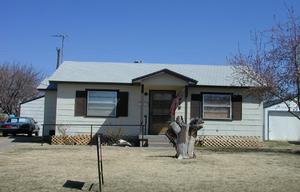 4615 South Bonham Street Amarillo, TX 79110 - Photo 1 of 1 a front view of a house with a garage
