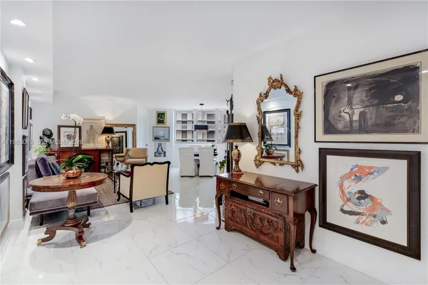 a room with furniture and a rug