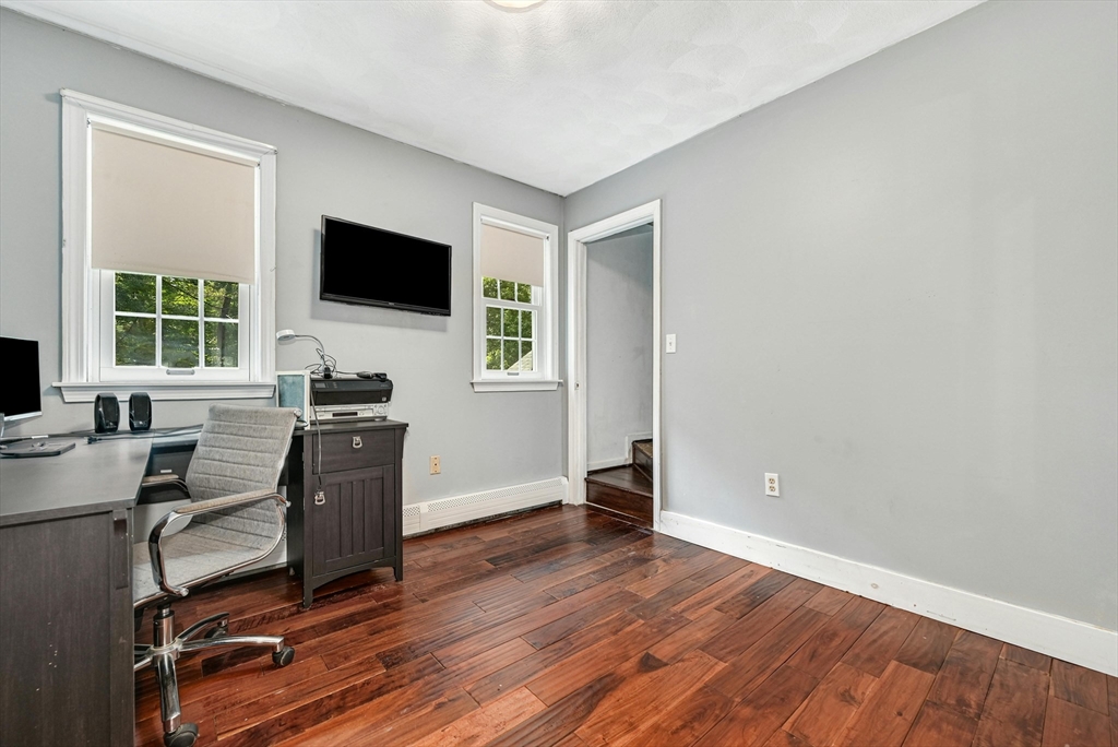 210 New Boston Road Sturbridge, MA 01566 - Photo 25 of 42 a view of a livingroom with workspace and a window