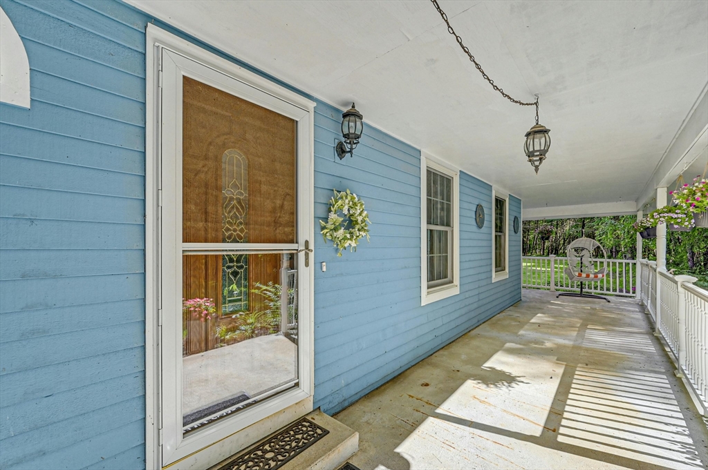 210 New Boston Road Sturbridge, MA 01566 - Photo 4 of 42 a view of a balcony with furniture