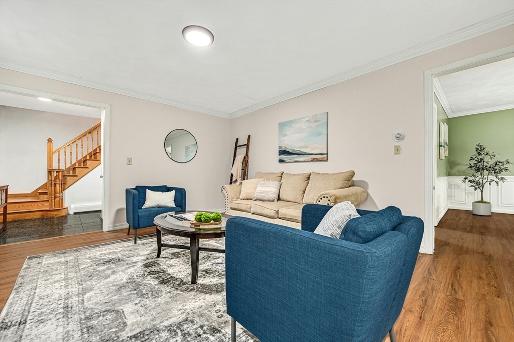 210 New Boston Road Sturbridge, MA 01566 - Photo 7 of 42 a living room with furniture and wooden floor