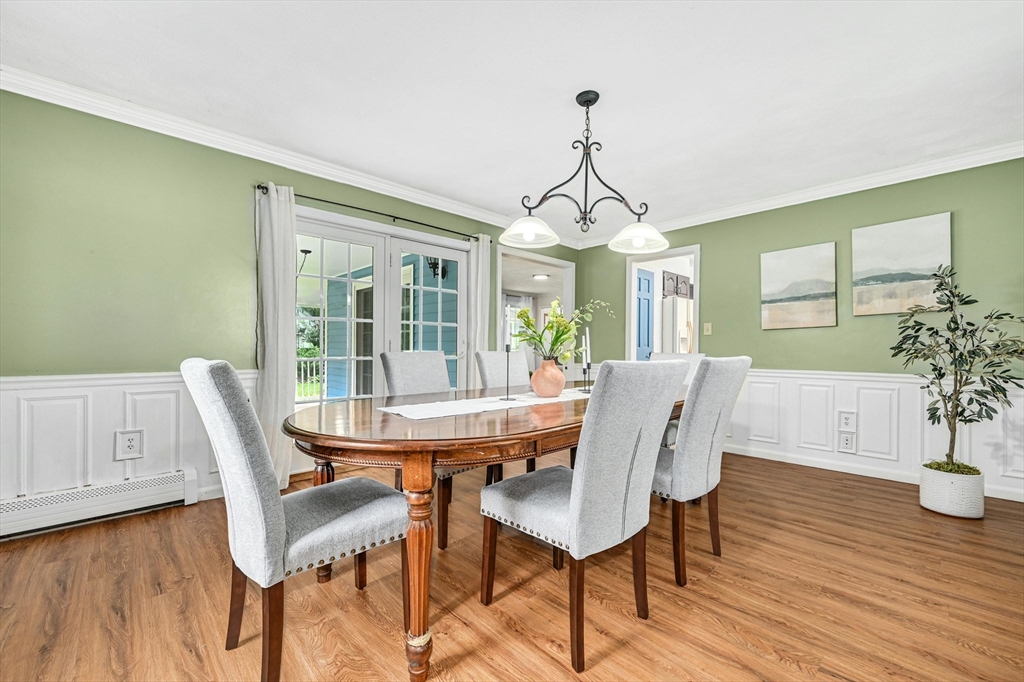 210 New Boston Road Sturbridge, MA 01566 - Photo 9 of 42 a view of a dining room with furniture window and wooden floor