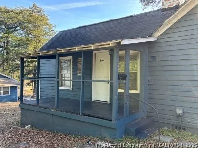 a view of a glass door of the house