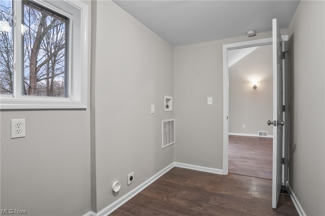 4159 Darrow Road Stow, OH 44224 - Photo 6 of 23 Mud/Laundry room with natural sunlight, washer/dryer hookup and access to attached garage