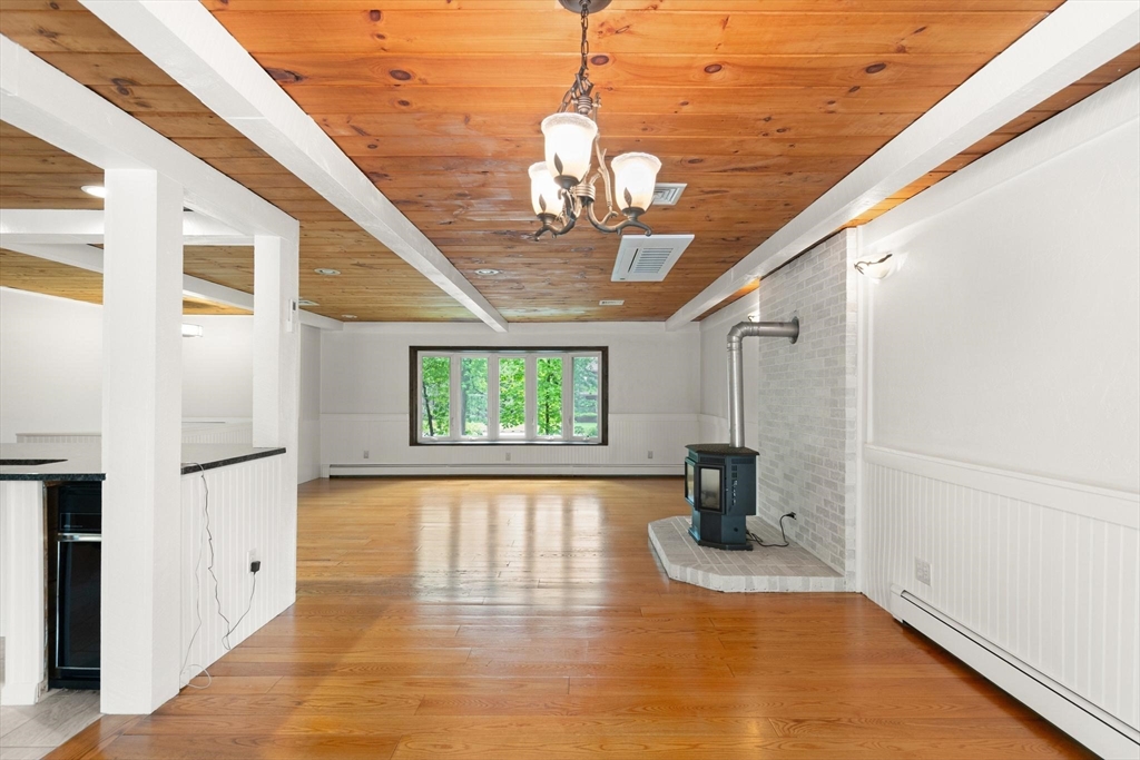 901 Haverhill Street Rowley, MA 01969 - Photo 17 of 42 a view of a livingroom with a ceiling fan and window