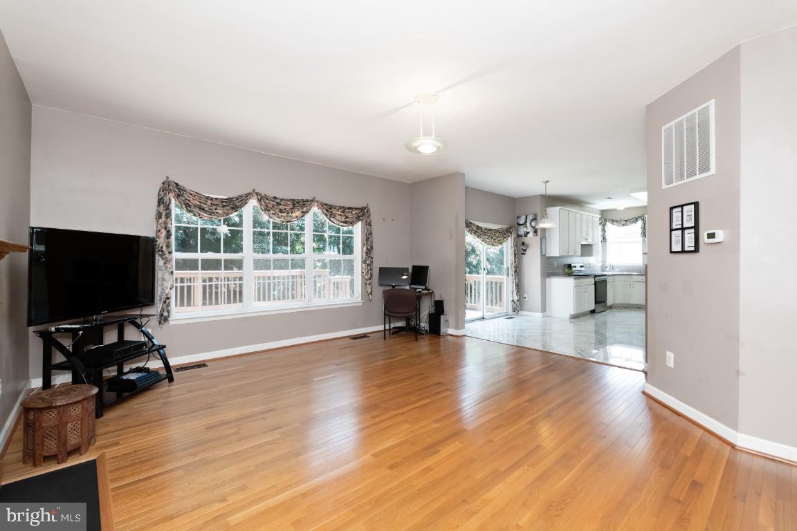 9702 Watts Road Owings Mills, MD 21117 - Photo 17 of 52 Family room with hardwood floors