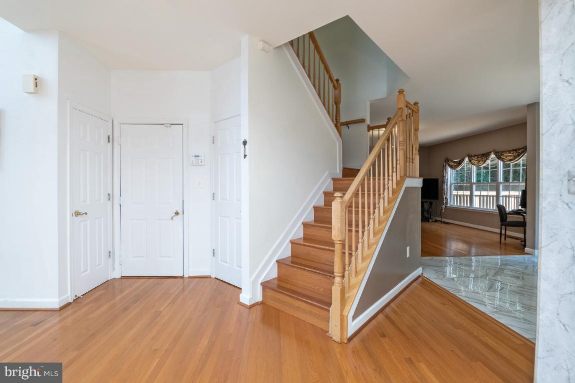 9702 Watts Road Owings Mills, MD 21117 - Photo 19 of 52 Staircase leading to 4 bedrooms on upper level