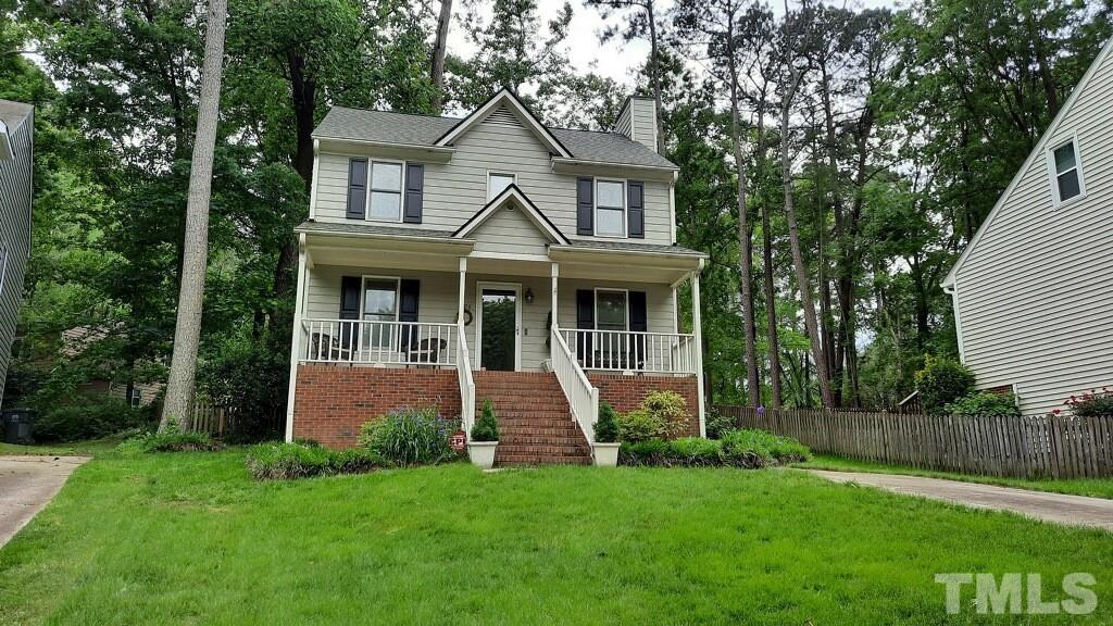 4728 Worchester Place Raleigh, NC 27604 - Photo 2 of 7 front view of a house with a yard