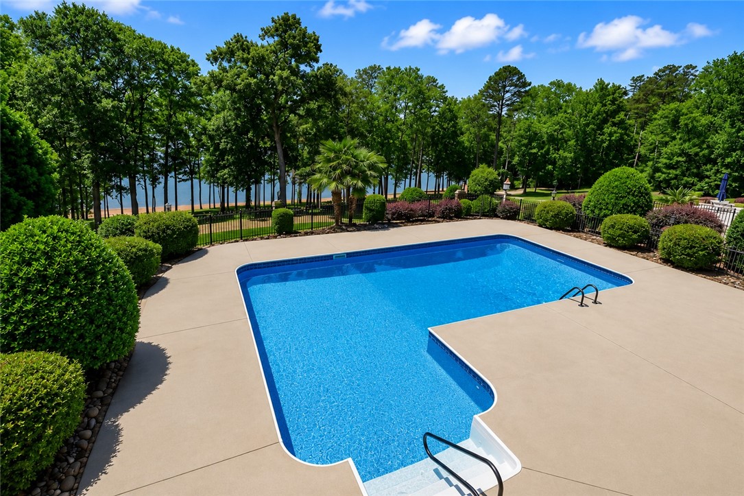 114 Willowbend Drive Anderson, SC 29621 - Photo 13 of 50 This tranquil outdoor oasis offers a refreshing pool with serene waterfront views.