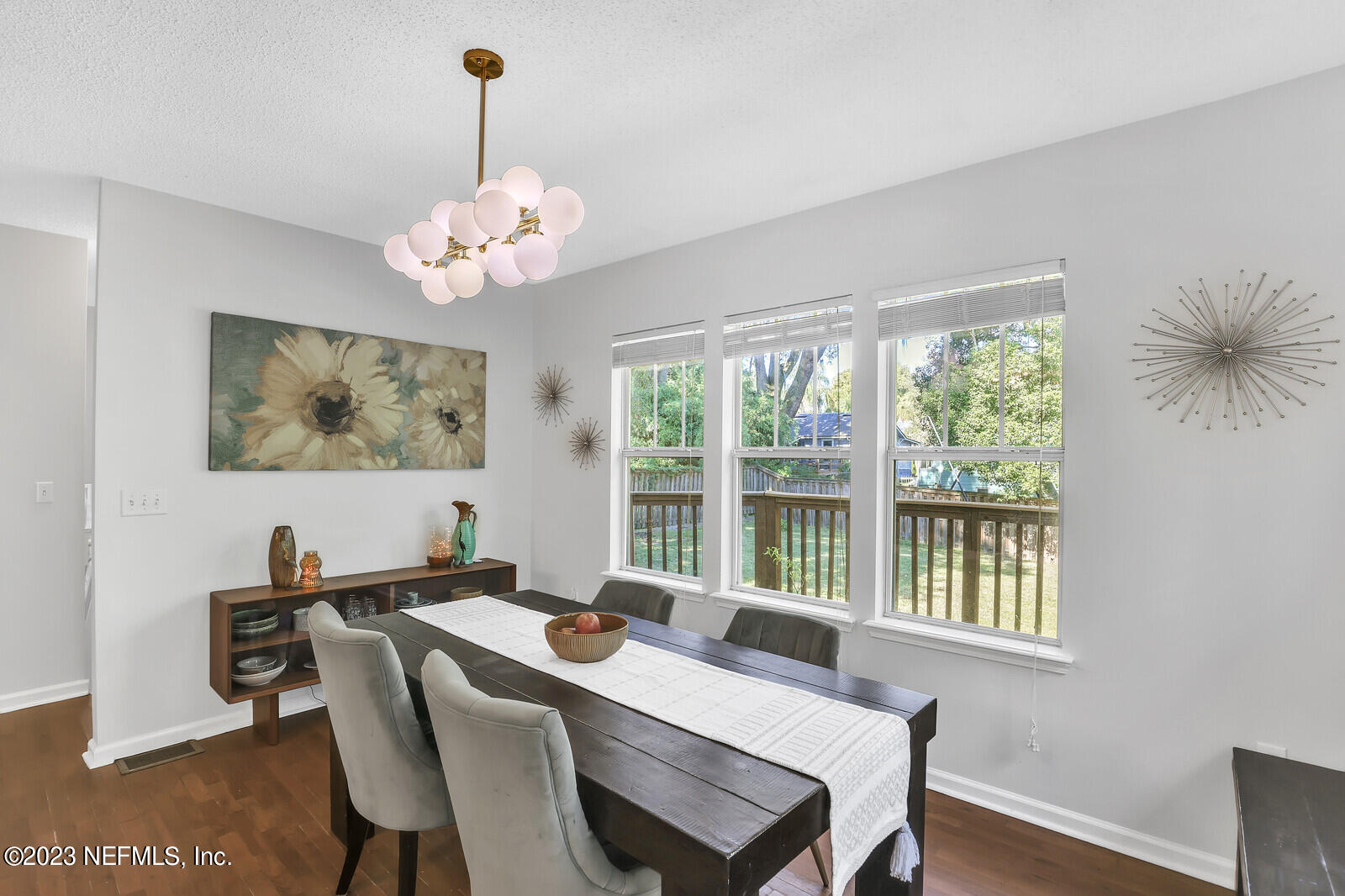 3803 Valencia Road Jacksonville, FL 32205 - Photo 13 of 58 a view of a dining room with furniture window and outside view