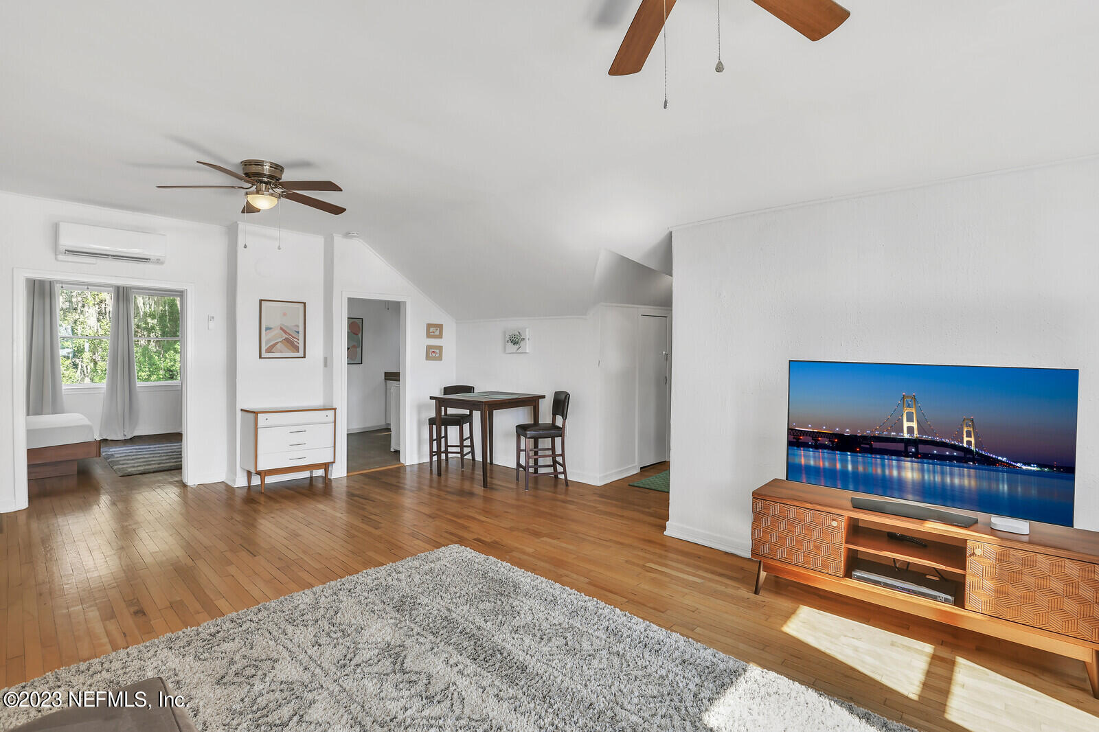 3803 Valencia Road Jacksonville, FL 32205 - Photo 25 of 58 a living room with furniture and wooden floor