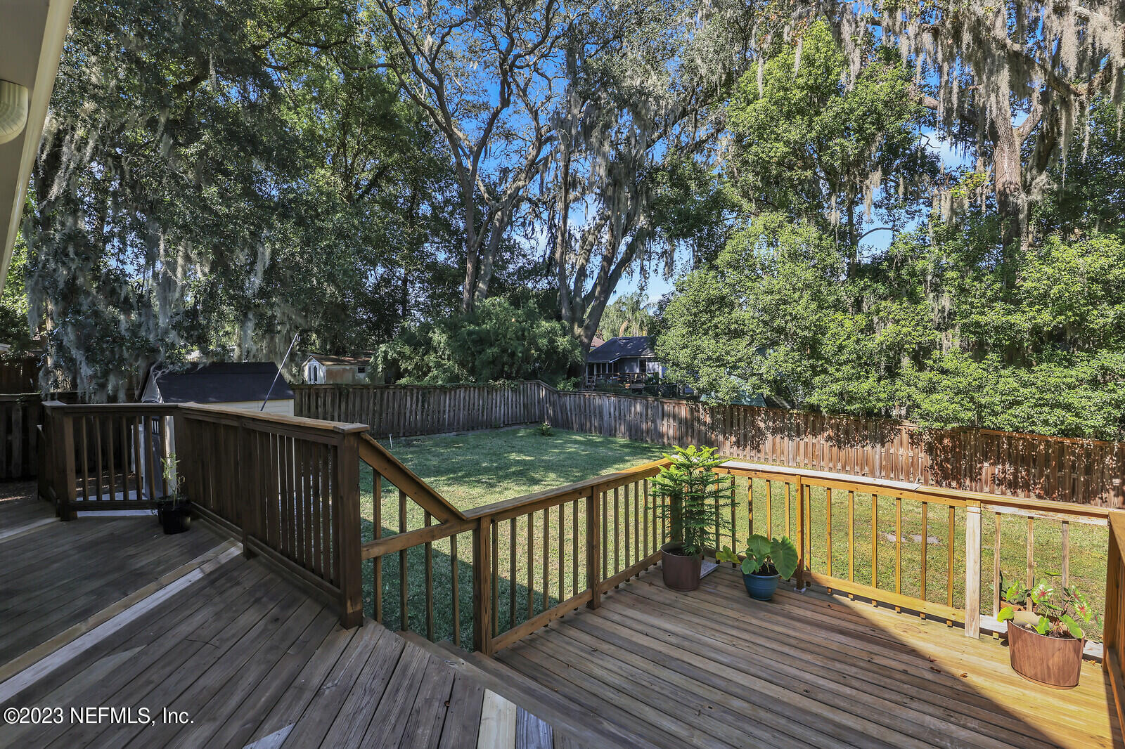 3803 Valencia Road Jacksonville, FL 32205 - Photo 37 of 58 a view of balcony with wooden floor and fence