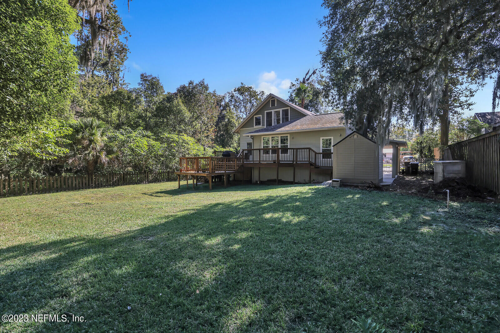 3803 Valencia Road Jacksonville, FL 32205 - Photo 40 of 58 a front view of a house with a garden and trees