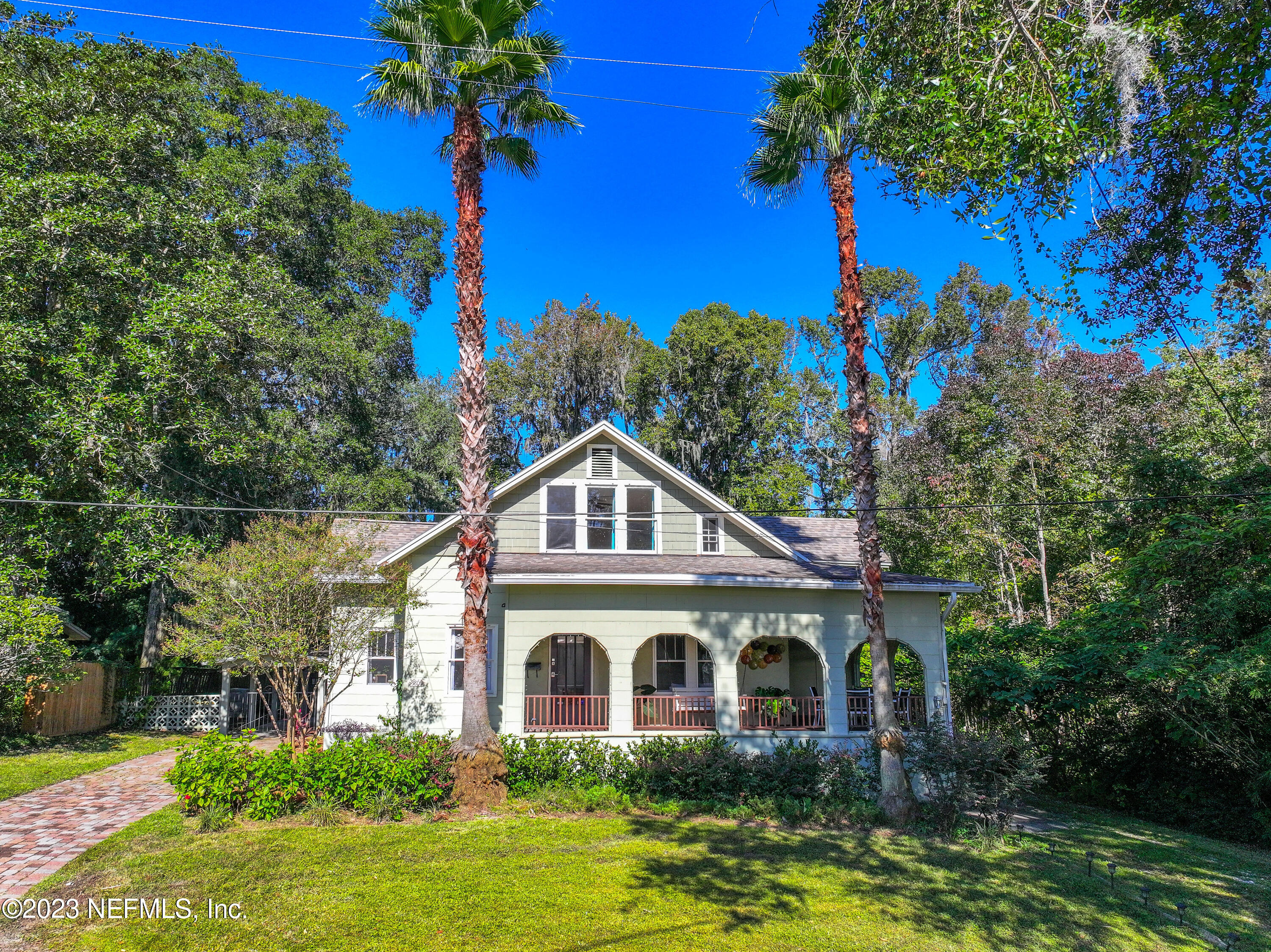 3803 Valencia Road Jacksonville, FL 32205 - Photo 43 of 58 a front view of a house with a garden