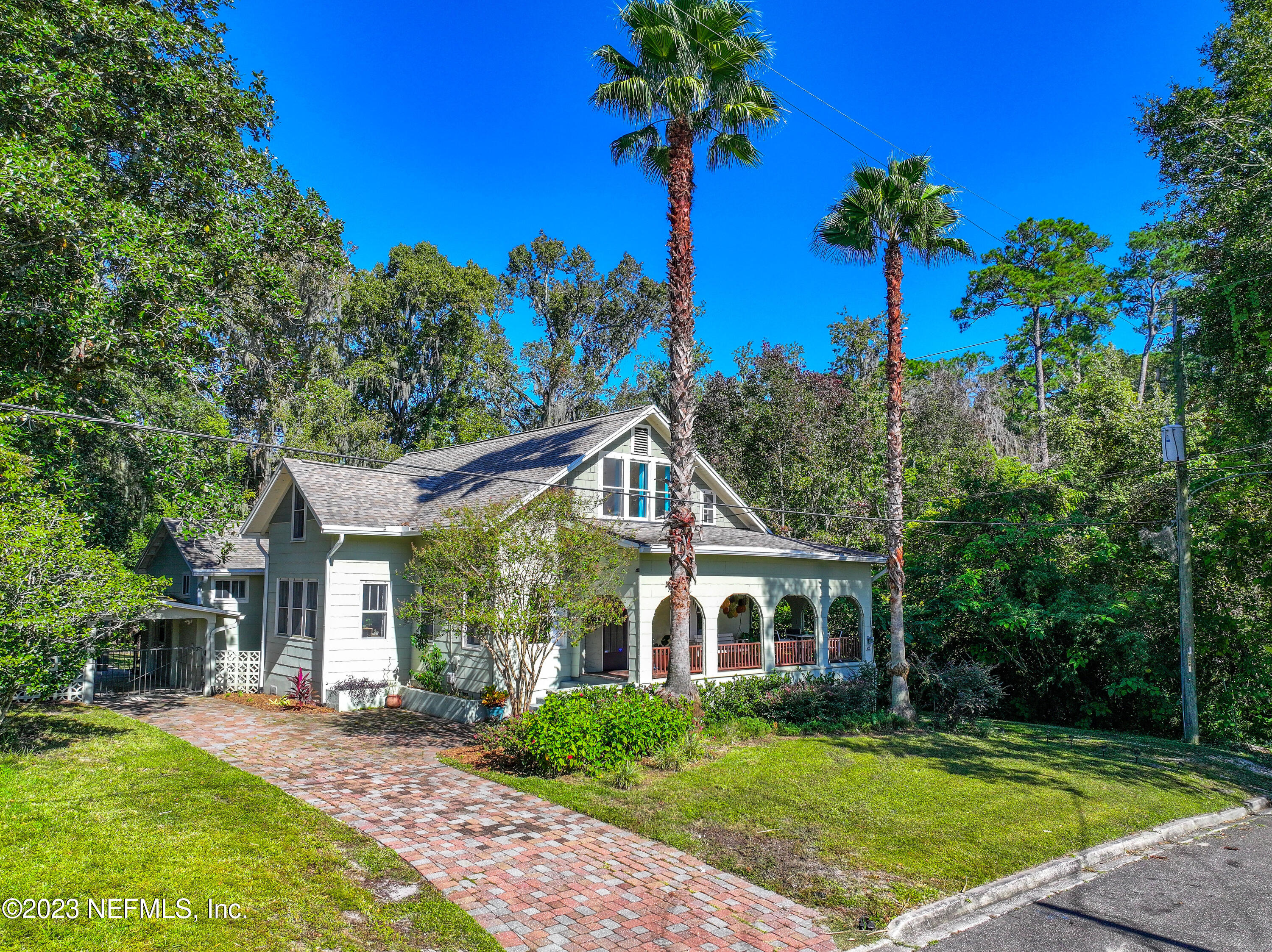 3803 Valencia Road Jacksonville, FL 32205 - Photo 44 of 58 a front view of a house with a garden