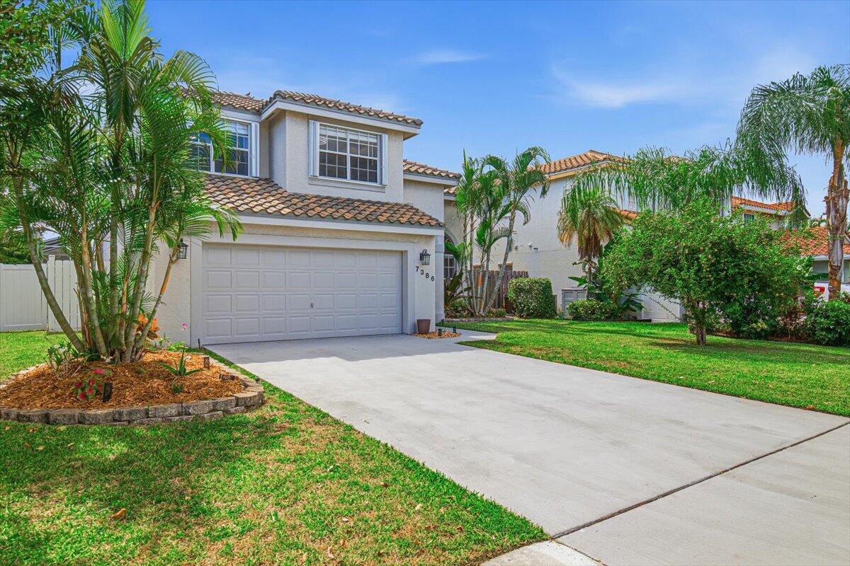 7386 Michigan Isle Road Lake Worth, FL 33467 - Photo 57 of 59 44-Front Home-B