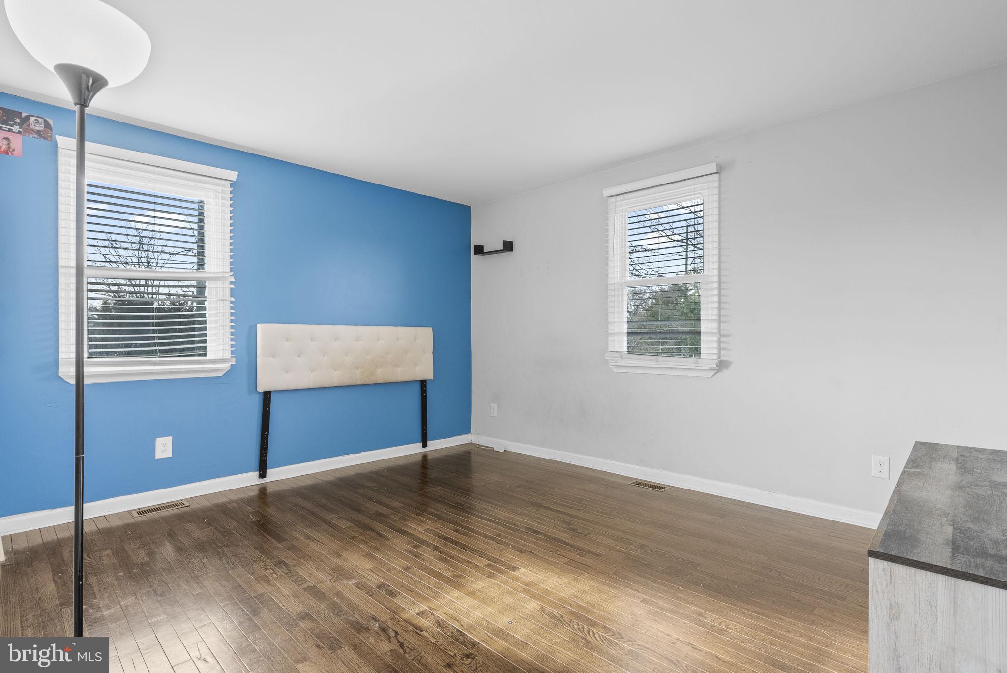 3 Birch Avenue Berlin, NJ 08009 - Photo 15 of 35 a view of an empty room with wooden floor and a window