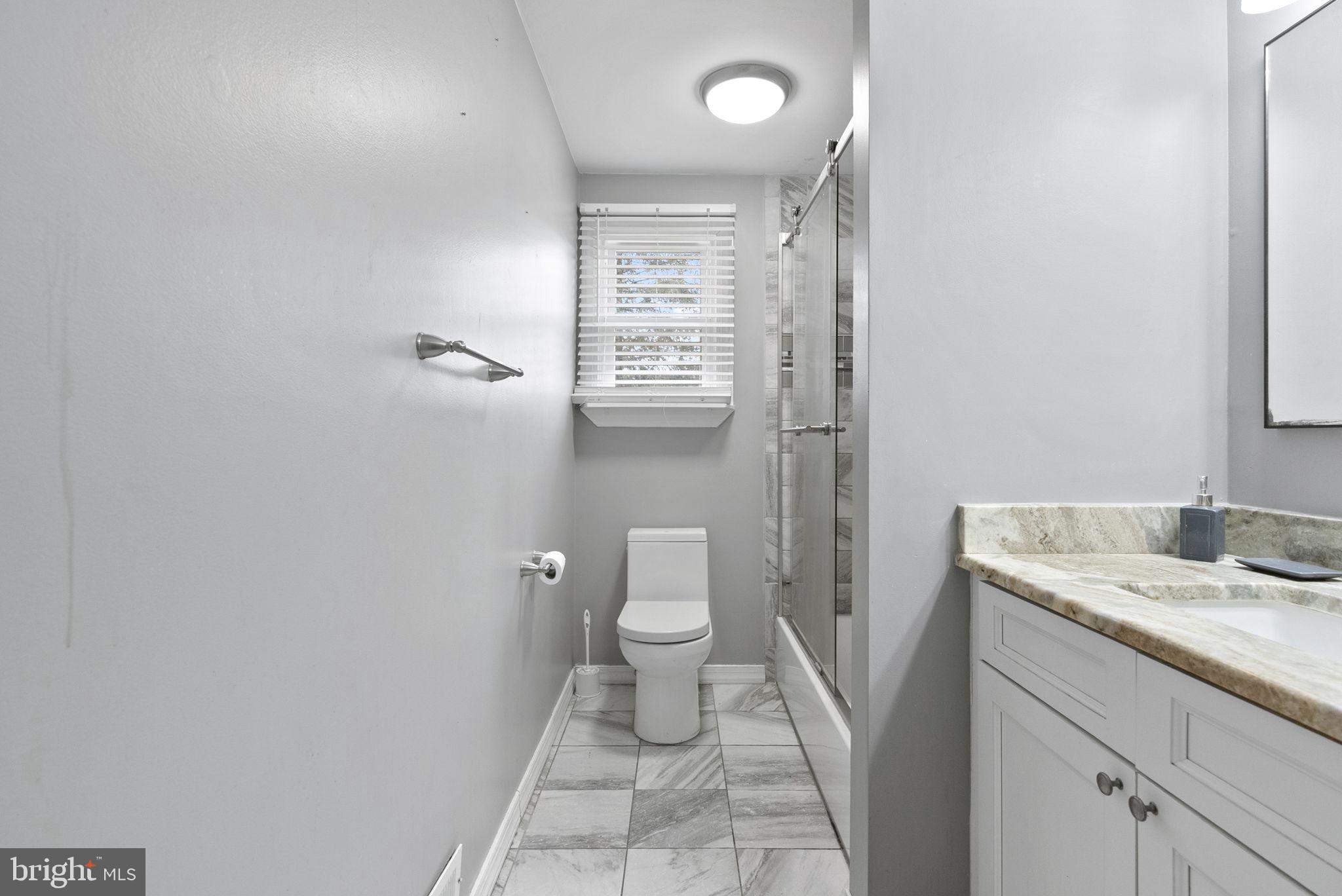 3 Birch Avenue Berlin, NJ 08009 - Photo 17 of 35 a bathroom with a granite countertop sink toilet and shower