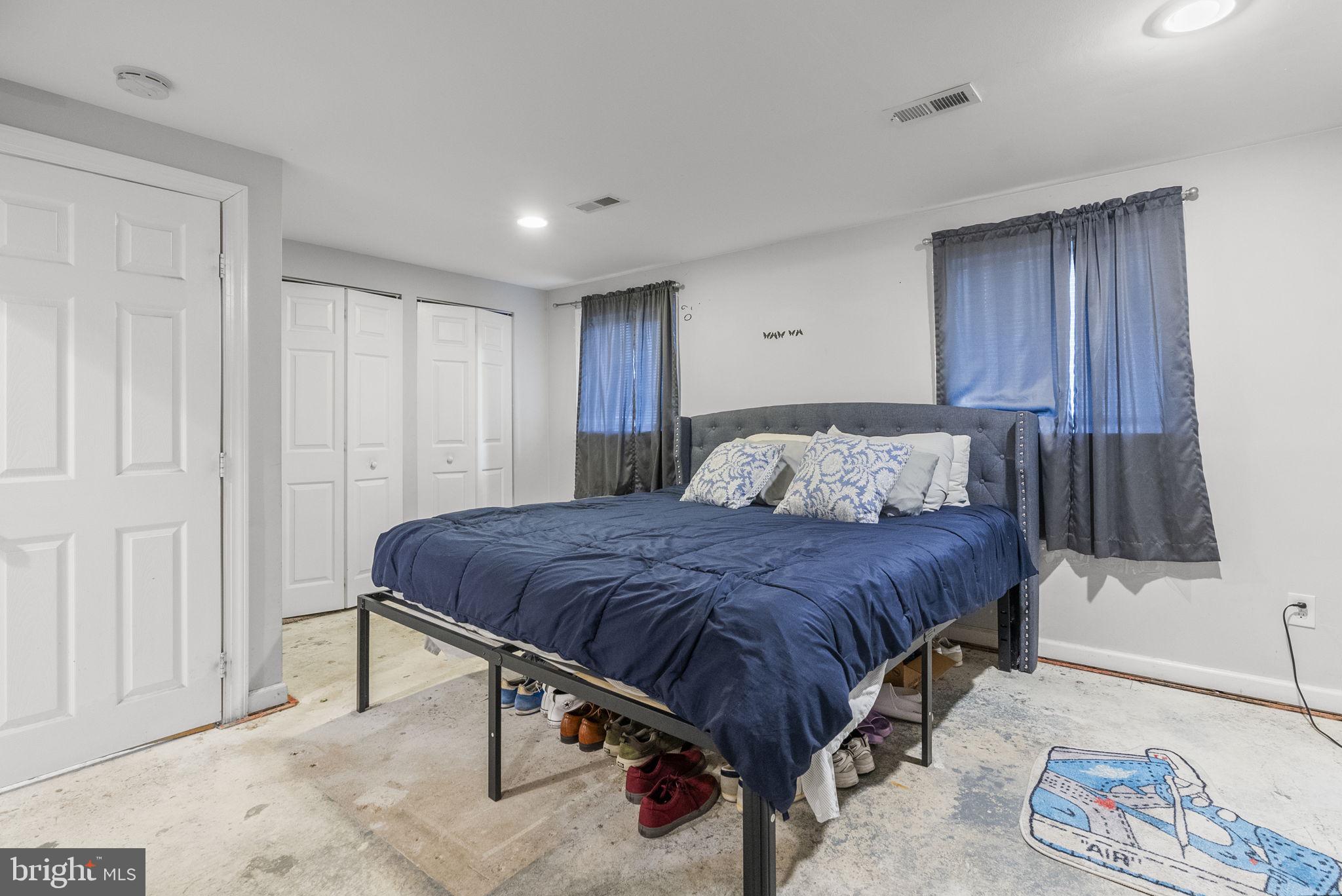 3 Birch Avenue Berlin, NJ 08009 - Photo 26 of 35 a bedroom with a bed a table and chair