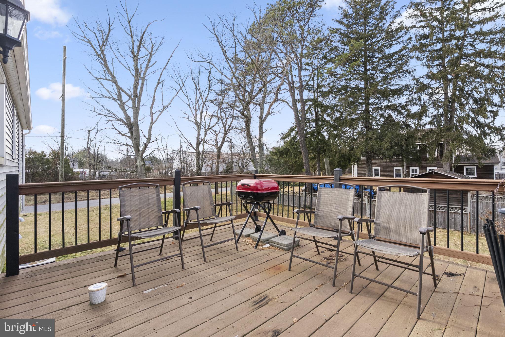 3 Birch Avenue Berlin, NJ 08009 - Photo 28 of 35 a view of deck with chairs and wooden floor