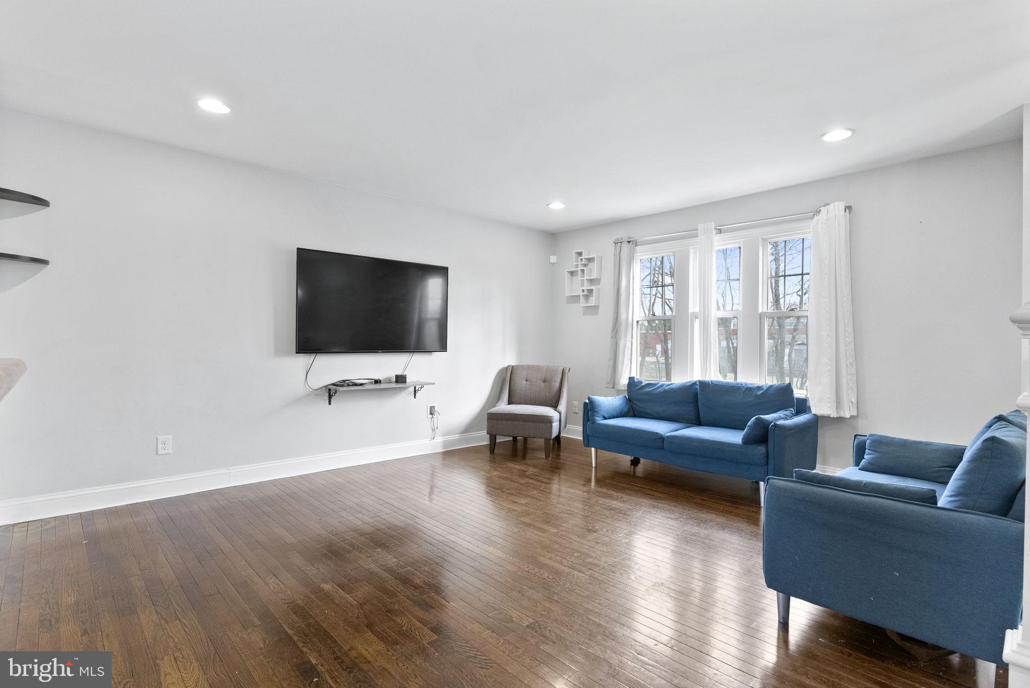 3 Birch Avenue Berlin, NJ 08009 - Photo 4 of 35 a living room with furniture and a flat screen tv