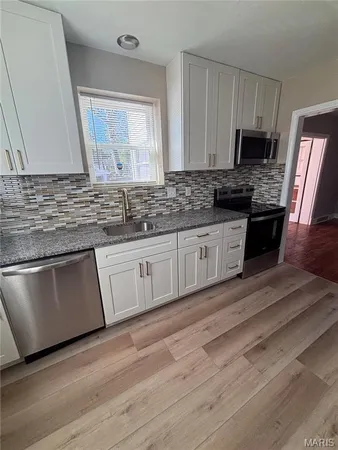 $2,450 | 7330 Ahern Avenue, University City, MO 63130