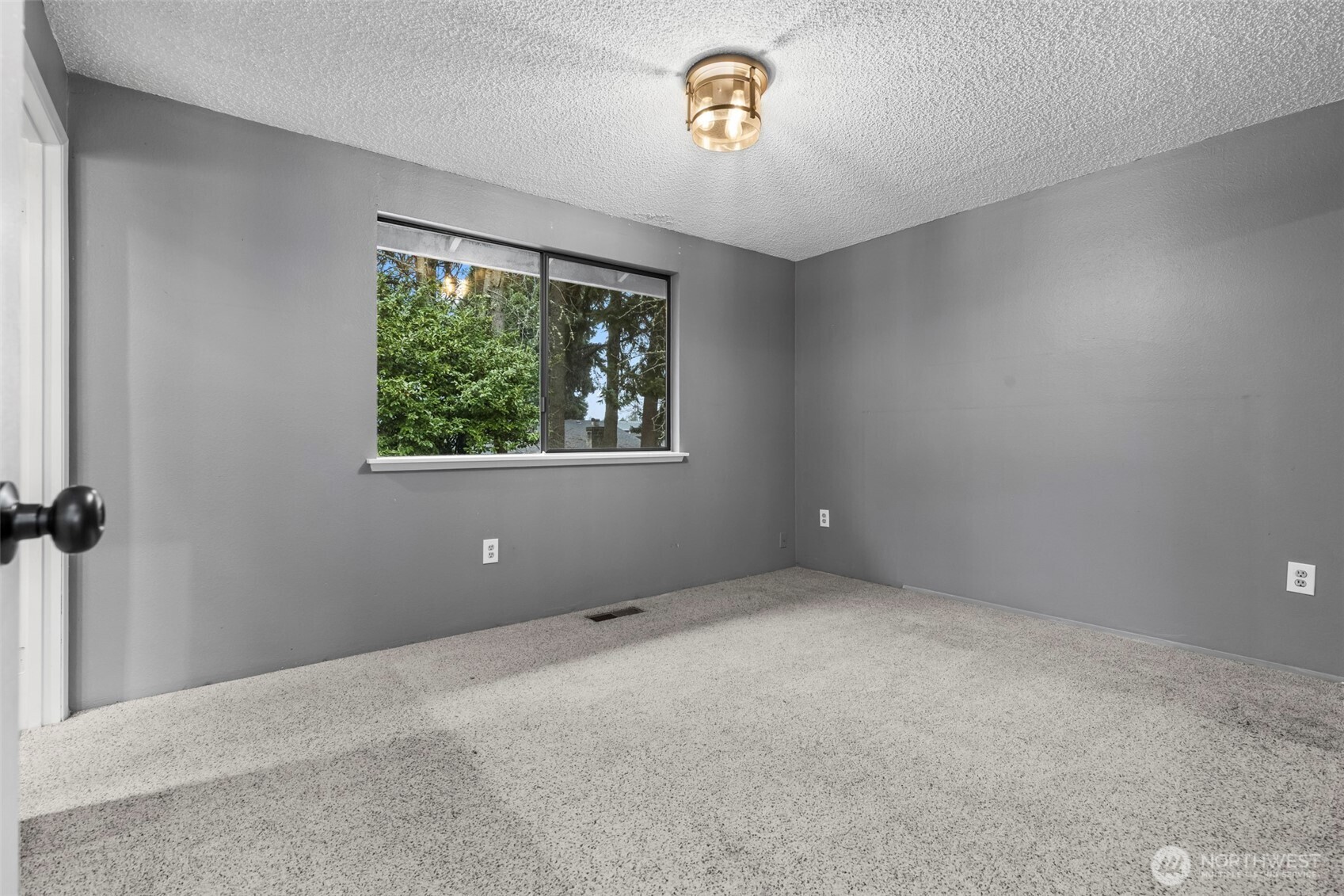 10329 99th Street Southwest Tacoma, WA 98498 - Photo 12 of 25 an empty room with a window