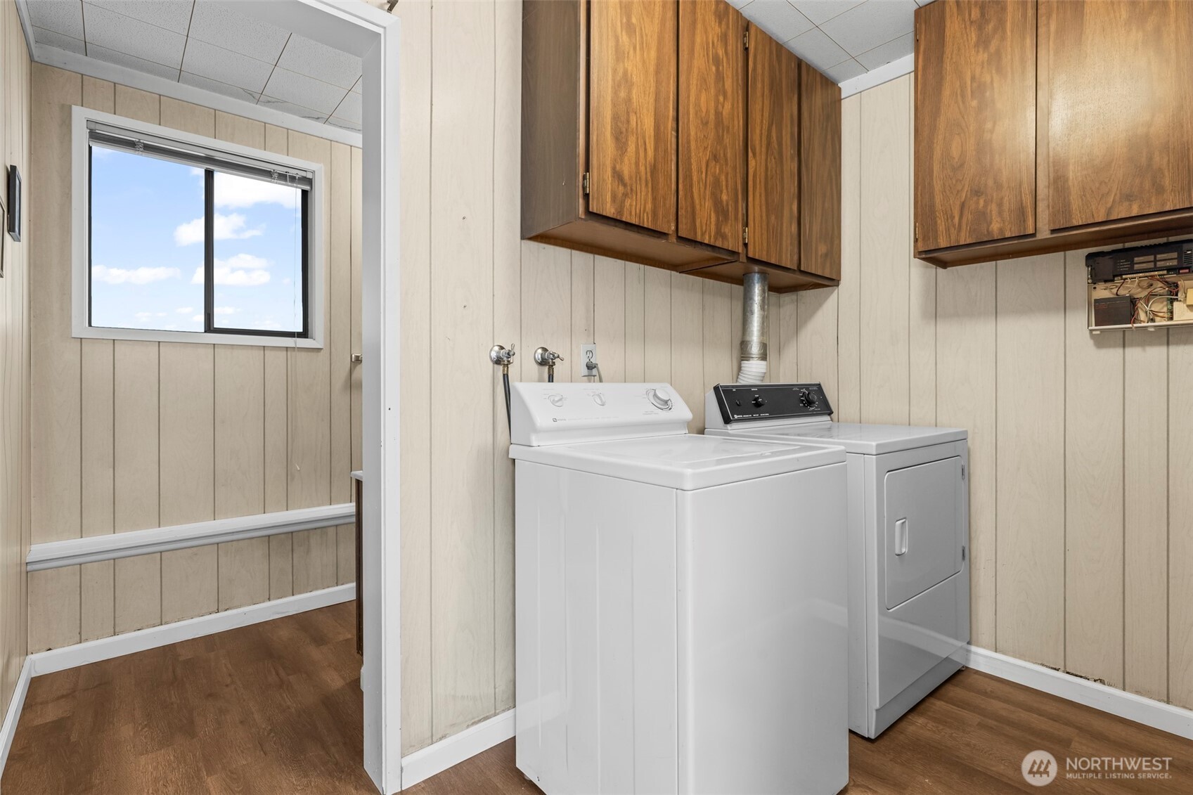 10329 99th Street Southwest Tacoma, WA 98498 - Photo 18 of 25 a utility room with wooden floor washer and dryer