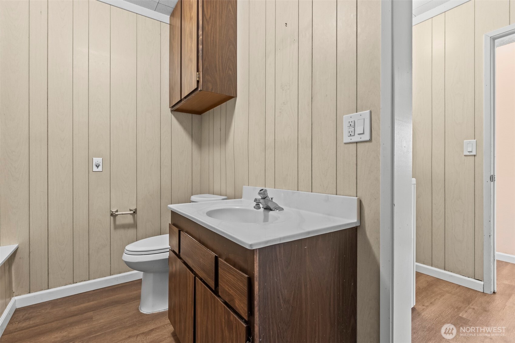10329 99th Street Southwest Tacoma, WA 98498 - Photo 19 of 25 a bathroom with a sink and a toilet