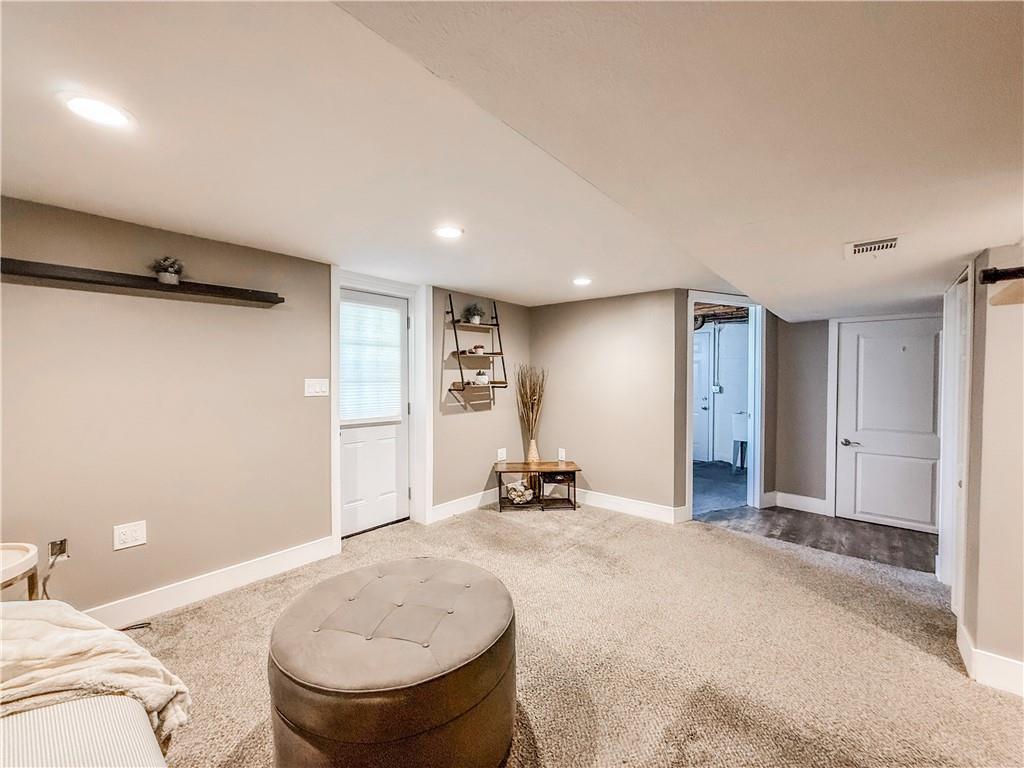650 Lindsay Road Carnegie, PA 15106 - Photo 16 of 35 a view of a livingroom with furniture and a ceiling fan
