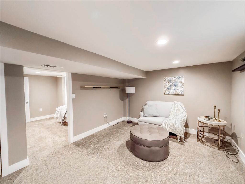 650 Lindsay Road Carnegie, PA 15106 - Photo 19 of 35 a living room with furniture and a window