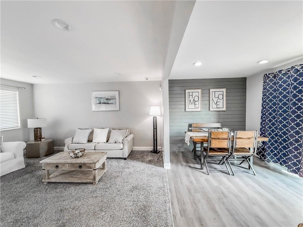 650 Lindsay Road Carnegie, PA 15106 - Photo 22 of 35 a living room with furniture and a wooden floor