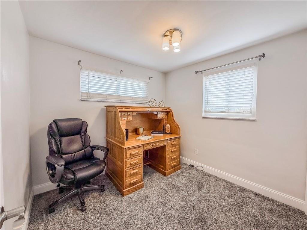 650 Lindsay Road Carnegie, PA 15106 - Photo 27 of 35 a living room with furniture and a chair