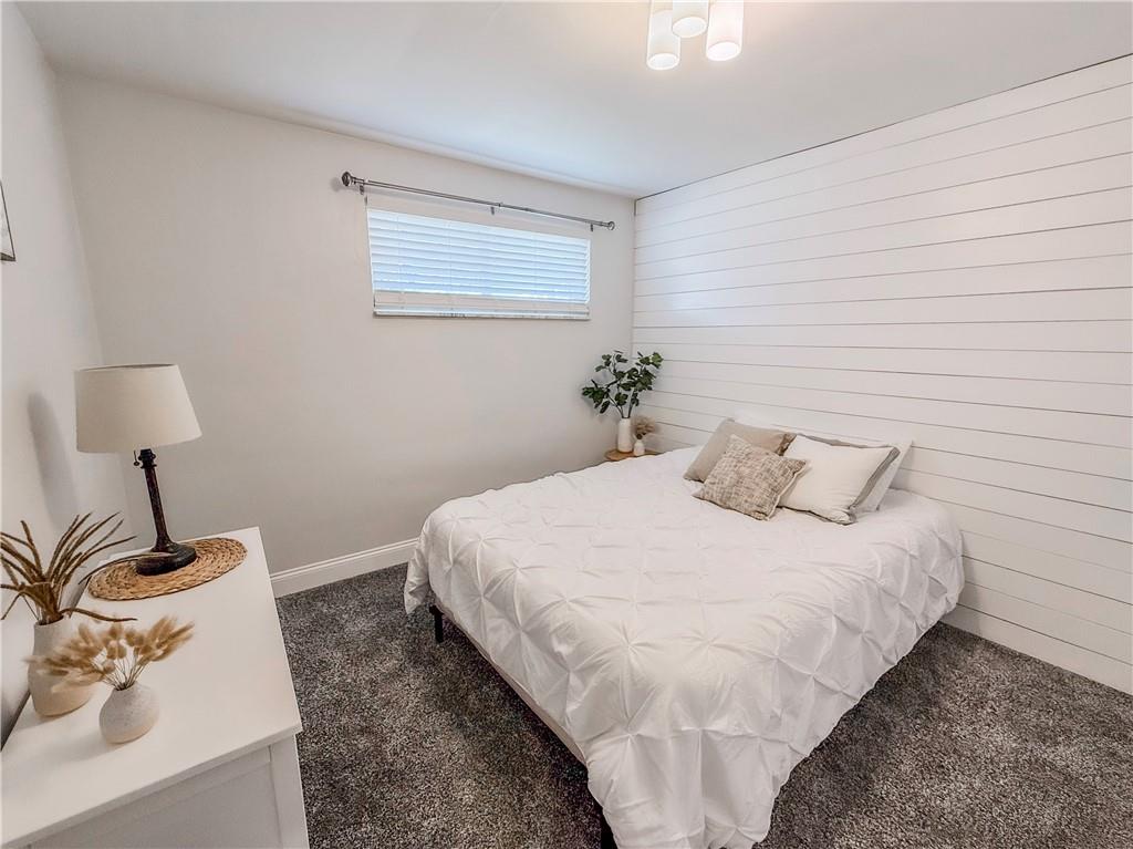 650 Lindsay Road Carnegie, PA 15106 - Photo 30 of 35 a bedroom with a bed and a window