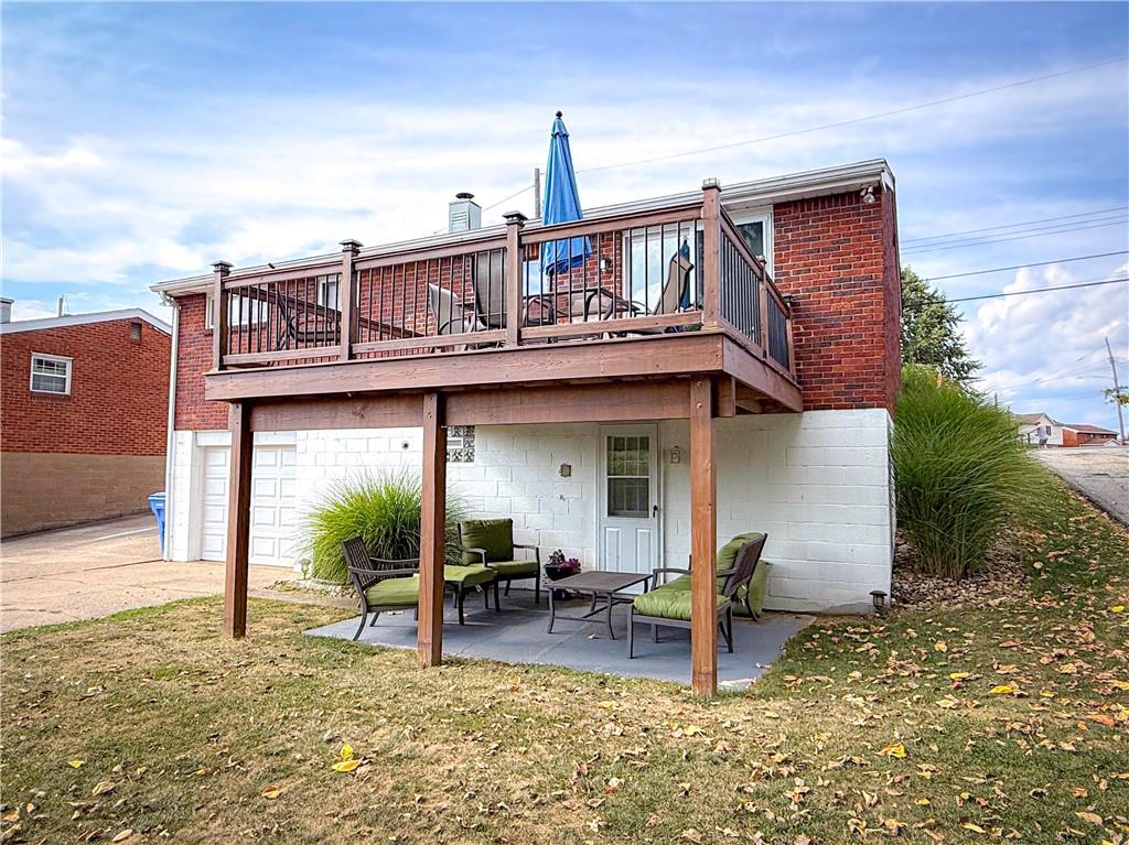 650 Lindsay Road Carnegie, PA 15106 - Photo 33 of 35 a view of a house with backyard porch and sitting area