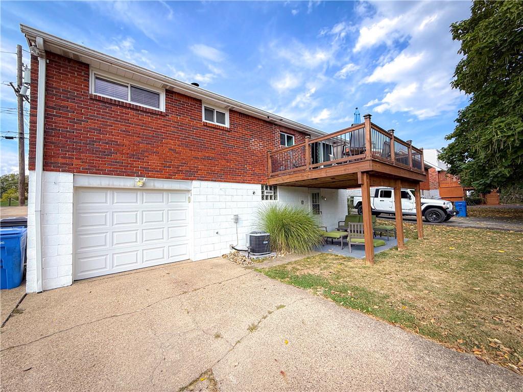650 Lindsay Road Carnegie, PA 15106 - Photo 35 of 35 a front view of a house with a yard outdoor seating and garage