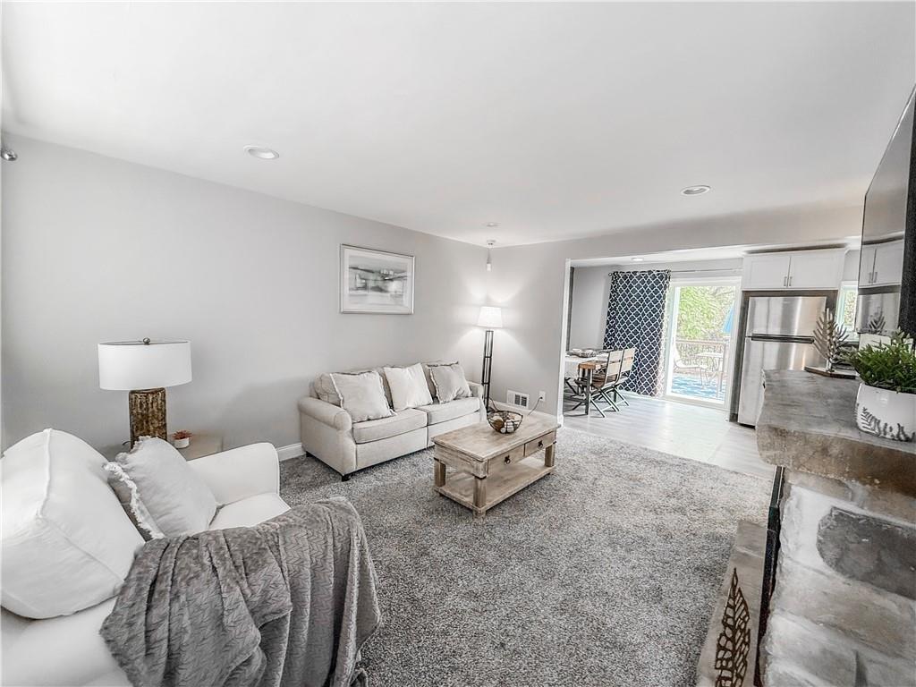 650 Lindsay Road Carnegie, PA 15106 - Photo 4 of 35 a living room with furniture and a table