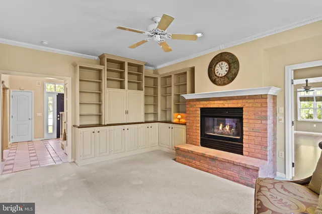 a kitchen with stainless steel appliances granite countertop a sink a stove and cabinets