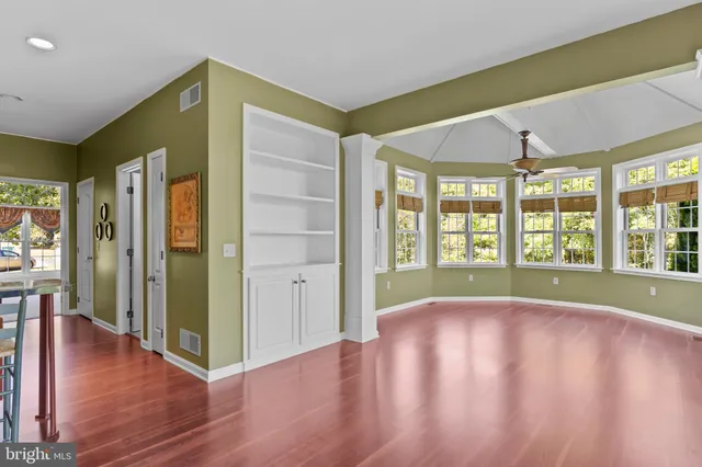a view of living room with a fireplace and furniture