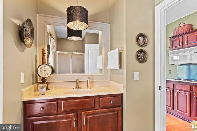 a bath tub sitting in a bathroom next to a window