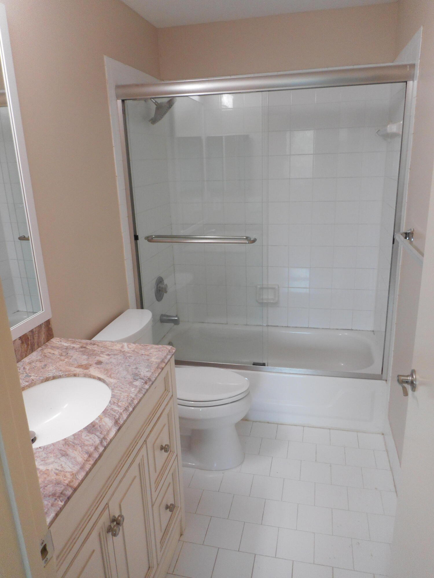 1741 Southwest 109th Terrace Davie, FL 33324 - Photo 18 of 30 a bathroom with a granite countertop sink toilet and shower