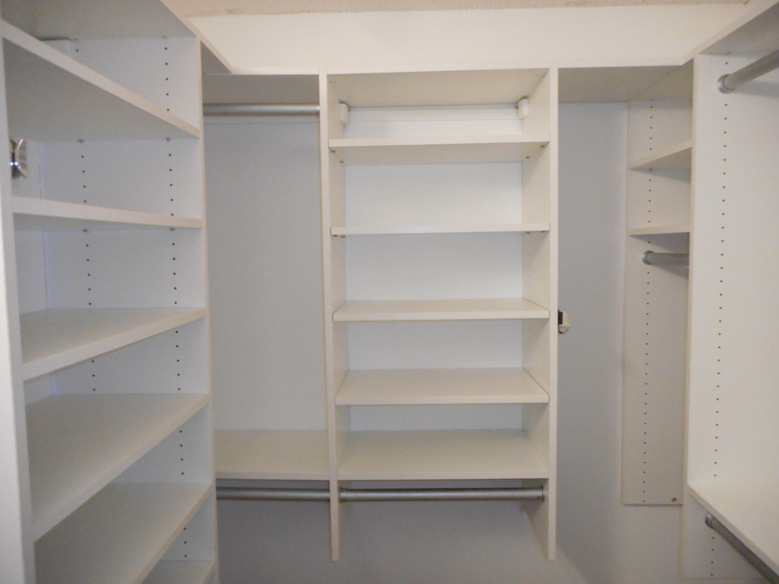 1741 Southwest 109th Terrace Davie, FL 33324 - Photo 19 of 30 a view of walk in closet with empty racks