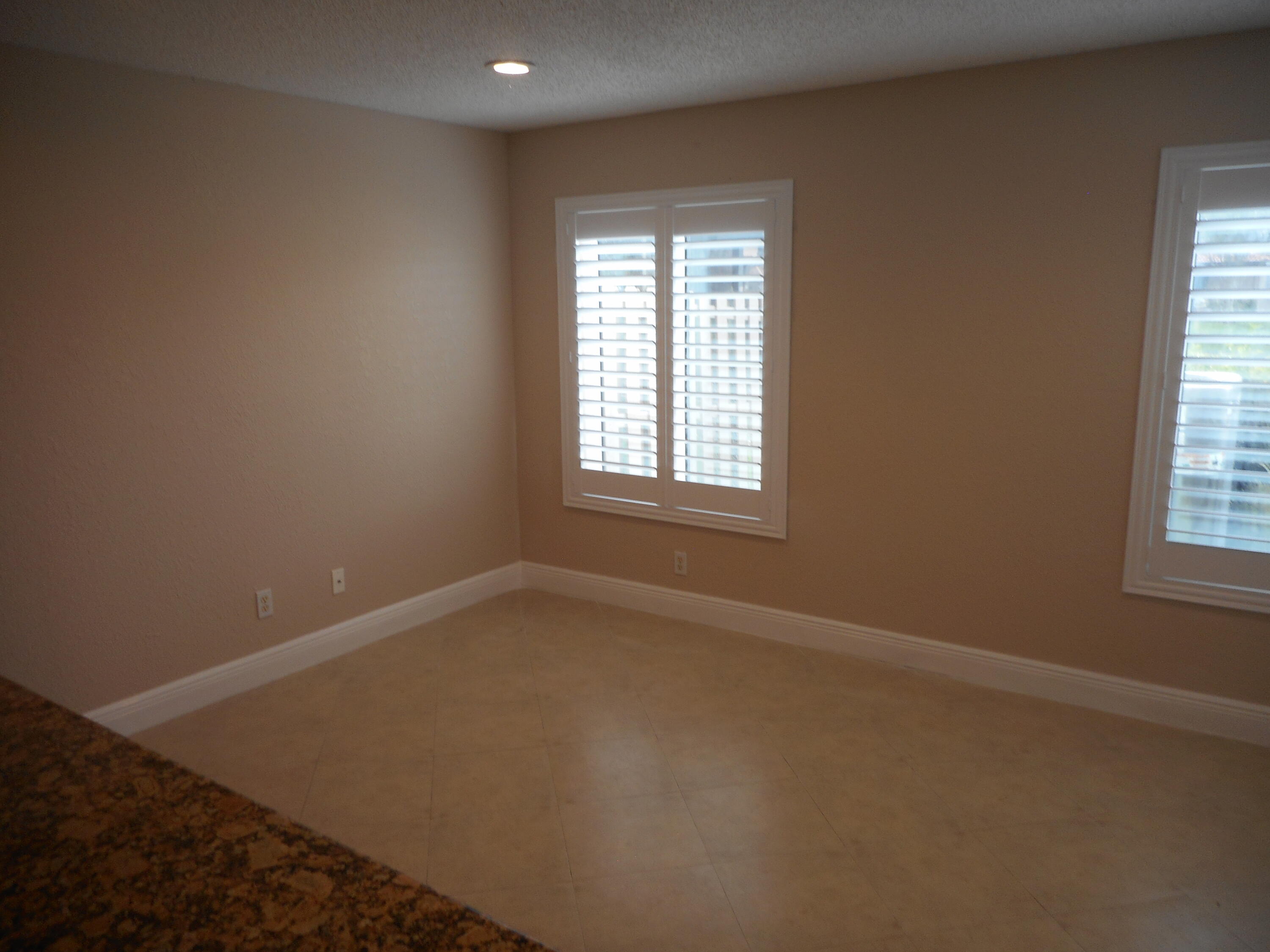 1741 Southwest 109th Terrace Davie, FL 33324 - Photo 26 of 30 an empty room with a window