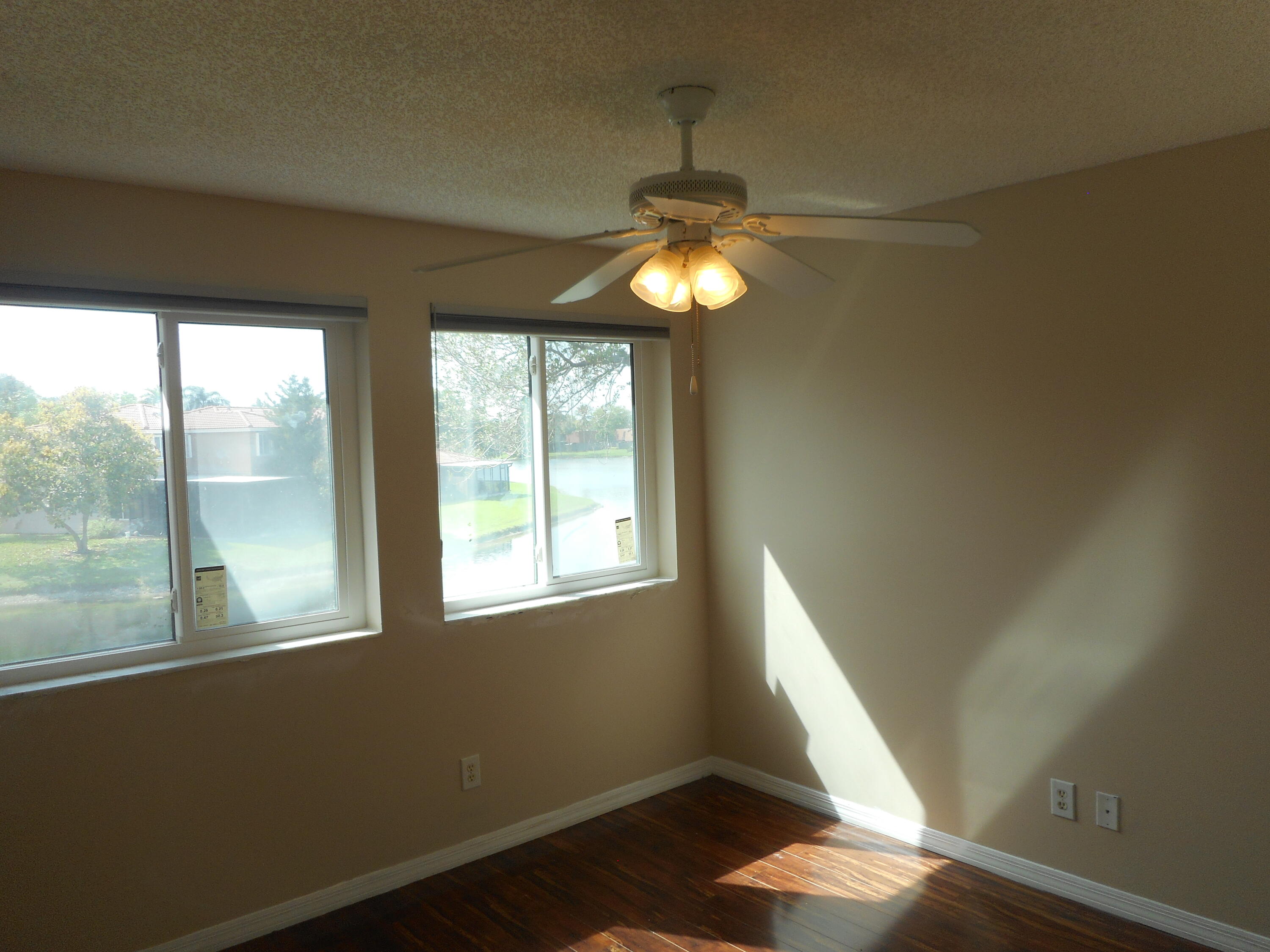 1741 Southwest 109th Terrace Davie, FL 33324 - Photo 30 of 30 a view of an empty room with wooden floor and a window