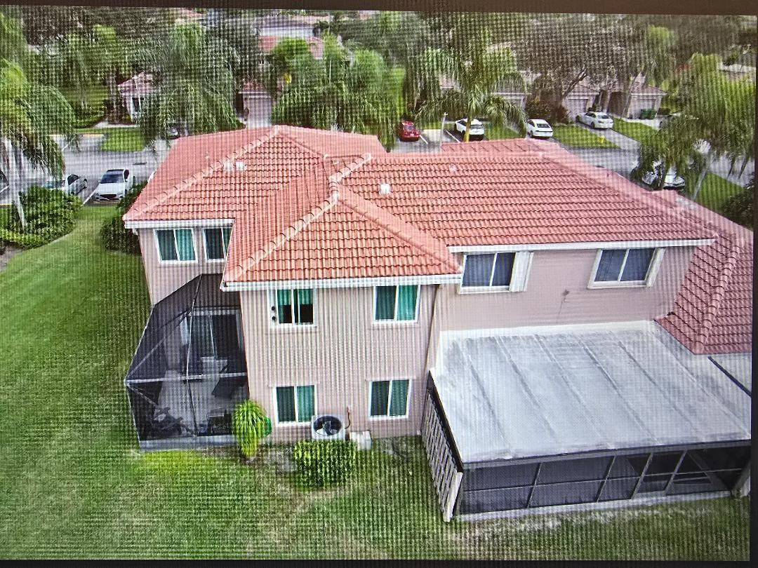 1741 Southwest 109th Terrace Davie, FL 33324 - Photo 4 of 30 a aerial view of a house with a yard