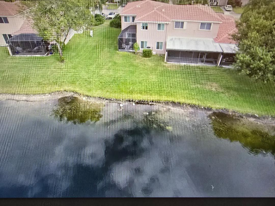 1741 Southwest 109th Terrace Davie, FL 33324 - Photo 5 of 30 a view of a house with a yard