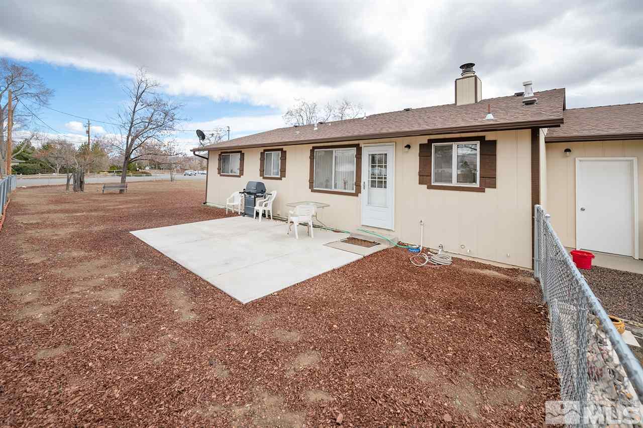 145 Ring Road Dayton, NV 89403 - Photo 12 of 17 a front view of a house with a yard