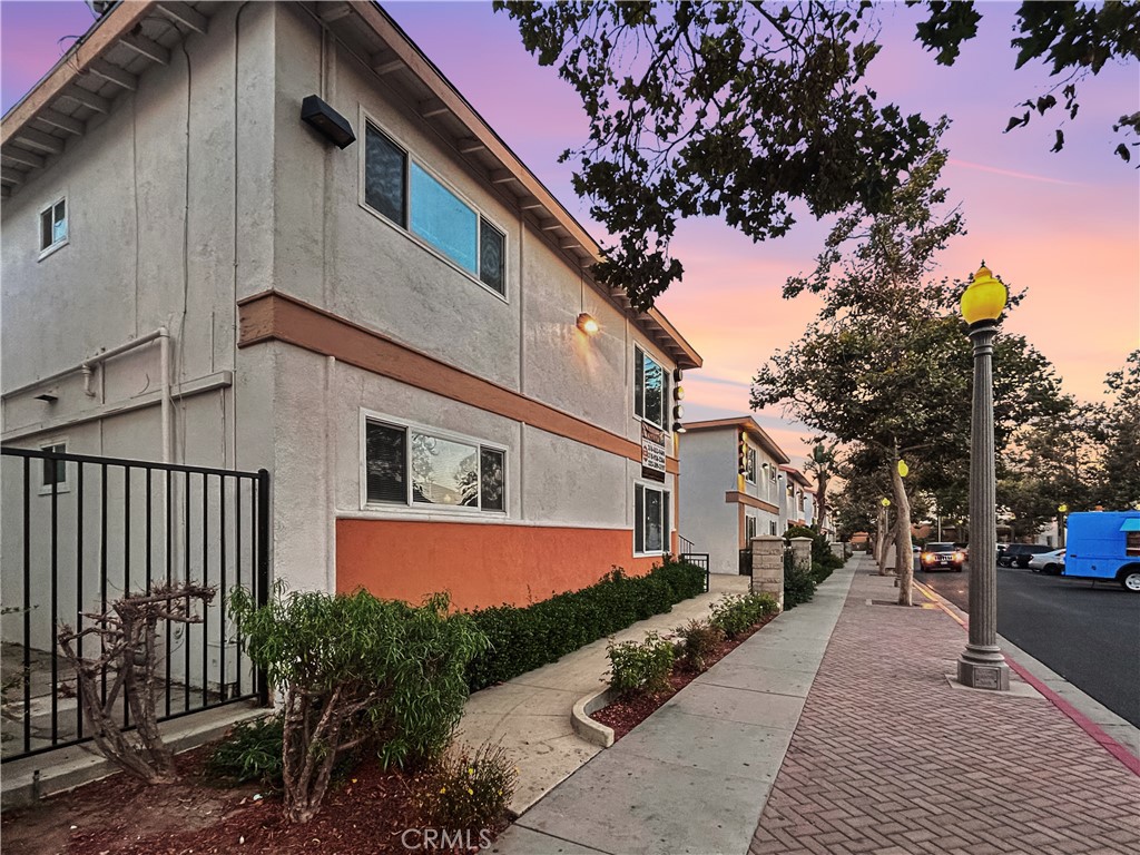 1109 South Minnie Street Santa Ana, CA 92701 - Photo 2 of 20 a front view of a house with a yard